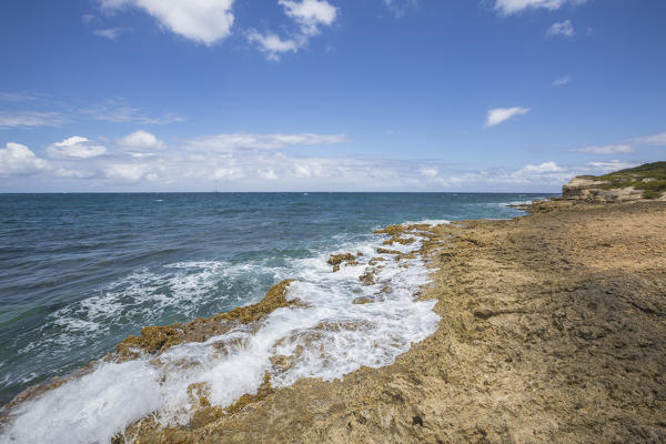 Clear waters of the Caribbean Sea seen from the cliffs of Green Island Antigua and Barbuda Leeward Island West Indies