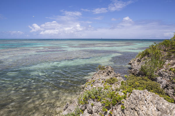 The turquoise shades of the Caribbean Sea seen from the cliffs of Green Island Antigua and Barbuda Leeward Island West Indies