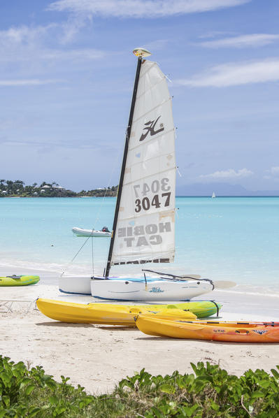 The resort on the Caribbean Sea and the boats for tourists Jolly Beach Antigua and Barbuda Leeward Island West Indies