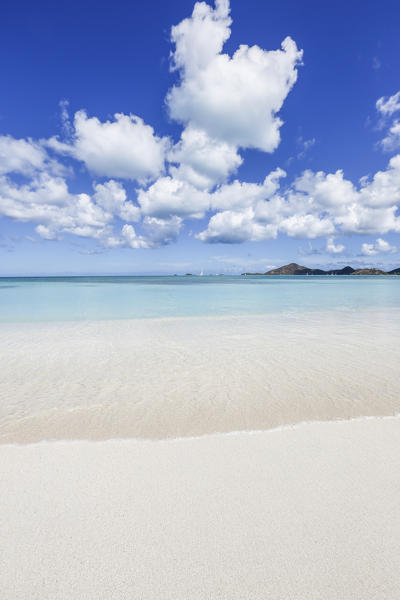 Blue sky frames the white sand and the turquoise Caribbean sea Ffryers Beach Antigua and Barbuda Leeward Islands West Indies