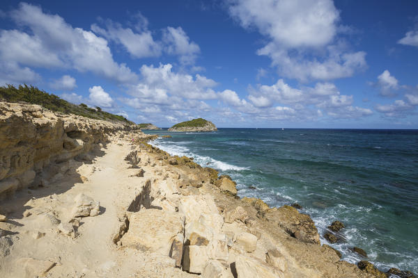 The waves of Caribbean sea crashing on the cliffs Half Moon Bay Antigua and Barbuda Leeward Island West Indies