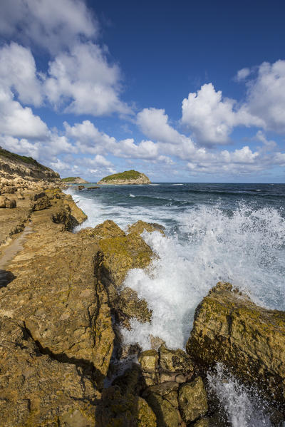 The waves of Caribbean sea crashing on the cliffs Half Moon Bay Antigua and Barbuda Leeward Island West Indies