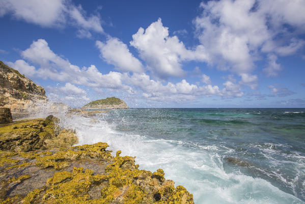 The waves of Caribbean sea crashing on the cliffs Half Moon Bay Antigua and Barbuda Leeward Island West Indies