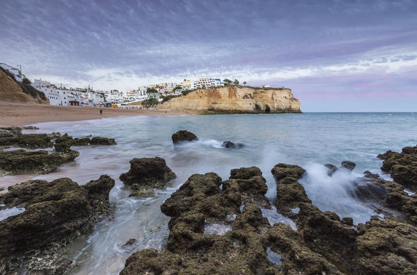 Sunset on the village of Carvoeiro surrounded by sandy beach and clear sea Lagoa Municipality Algarve Portugal Europe