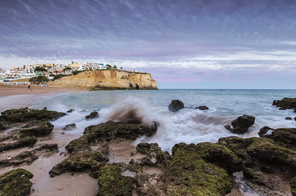 Sunset on the village of Carvoeiro surrounded by sandy beach and clear sea Lagoa Municipality Algarve Portugal Europe