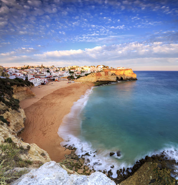 Panoramic view of the turquoise sea and the sandy beach at sunset Carvoeiro Lagoa Municipality Algarve Portugal Europe