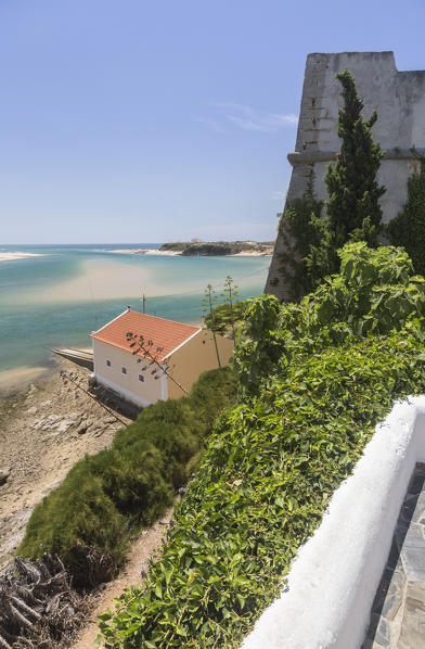 View from a terrace of Vila Nova de Milfontes surrounded by the turquoise ocean Odemira Alentejo region Portugal Europe