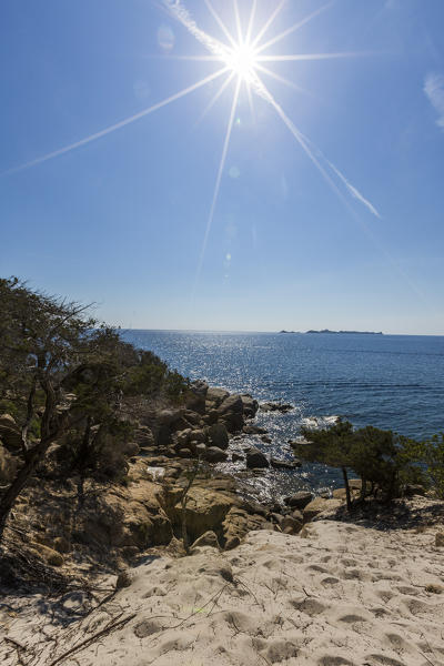 Sunbeams on the fine sand and the turquoise sea of Cala Pira Castiadas Cagliari Sardinia Italy Europe