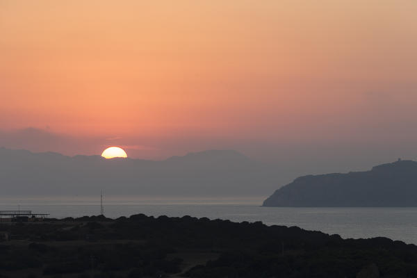 Sunset on the bay and the cliffs of Porto Giunco Villasimius Cagliari Sardinia Italy Europe