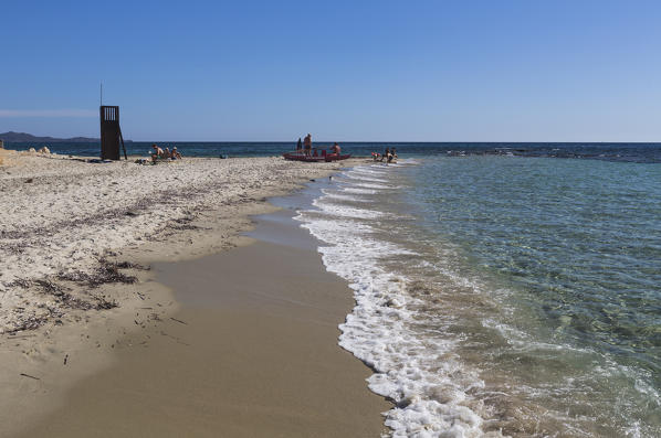 Lifeguard on the sandy beach surrounded by turquoise water of sea Sant Elmo Castiadas Costa Rei Cagliari Sardinia Italy Europe