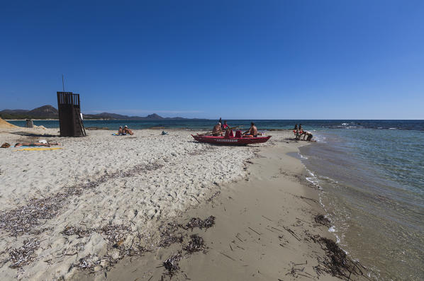 Lifeguard on the sandy beach surrounded by turquoise water of sea Sant Elmo Castiadas Costa Rei Cagliari Sardinia Italy Europe