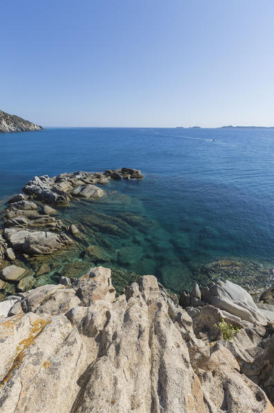 View of cliffs and headlands surrounding the turquoise sea Punta Molentis Villasimius Cagliari Sardinia Italy Europe