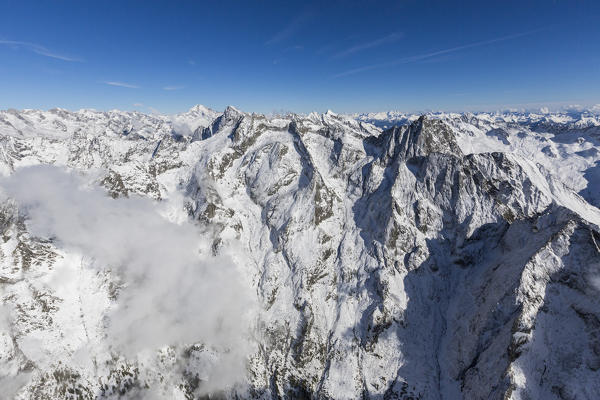 Aerial view of  the snow covered Sasso Manduino Val Codera Chiavenna Valley Valtellina Lombardy Italy Europe