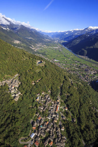 Aerial view of the village of Biolo surrounded by woods at fall Sondrio Province Valtellina Lombardy Italy Europe