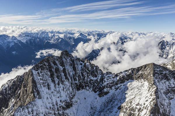 Aerial view of  the snow covered Sasso Manduino Val Dei Ratti Chiavenna Valley Valtellina Lombardy Italy Europe
