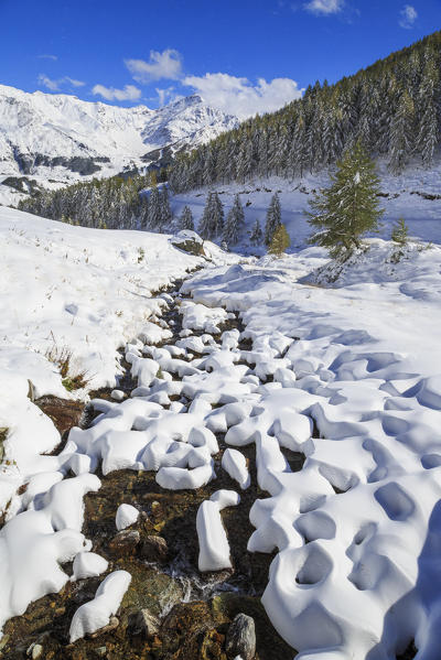 Aerial view of the snowy woods and high peaks Vamlera Febbraro Valley Spluga Valley Valtellina Lombardy Italy Europe