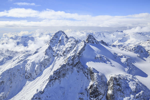 Aerial view of Peak Ferrè and Peaks Piani covered with snow Spluga Valley Chiavenna Valtellina Lombardy Italy Europe