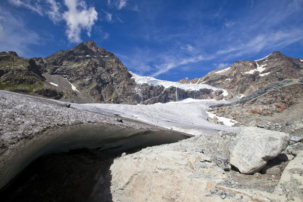 The shadow of a crevasse, a deep crack in the ice of the Fellaria glacier, Valmalenco, Valtellina, Lombardy Italy Europe