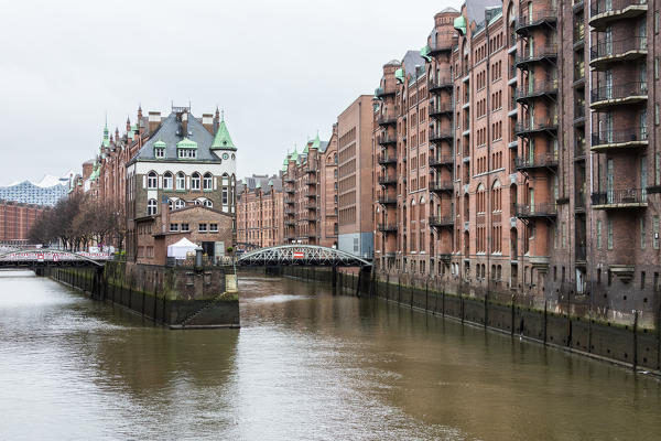 The picturesque water castle between bridges in the center of the canal Poggenmühlenbrücke Altstadt Hamburg Germany Europe
