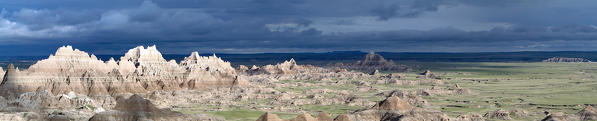 Sunset at the Badlands National Park, a national park in southwestern South Dakota that protects 242,756 acres of sharply eroded buttes, pinnacles, and spires blended with the largest undisturbed mixed grass prairie in the United States