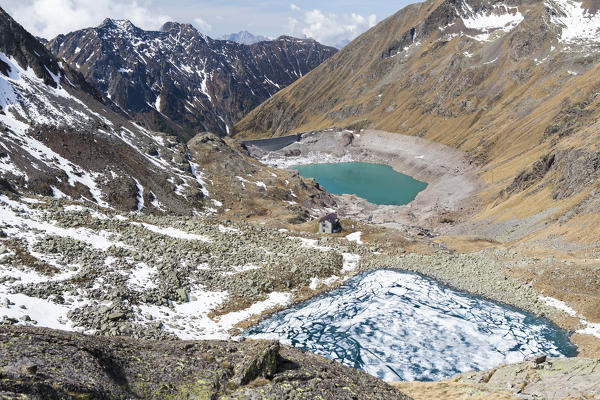 View of Lago Rotondo during thaw and Lake Baitone Val Malga Adamello Regional Park province of Brescia Lombardy Italy Europe