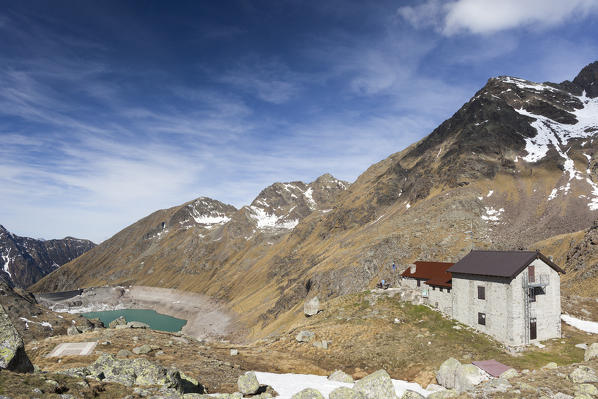 Rifugio Tonolini frames  Lake Baitone and  high peaks Val Malga Adamello Regional Park province of Brescia Lombardy Italy Europe