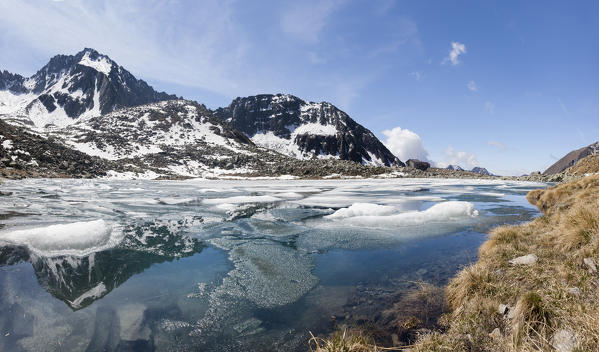 Panoramic of Lago Rotondo during summer thaw Val Malga Adamello Regional Park province of Brescia Lombardy Italy Europe