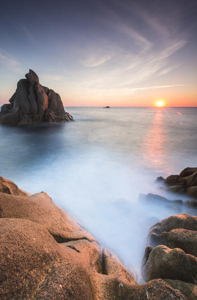The light of sunset on blue sea framed by cliffs Capo Testa Santa Teresa di Gallura Province of Sassari Sardinia Italy Europe