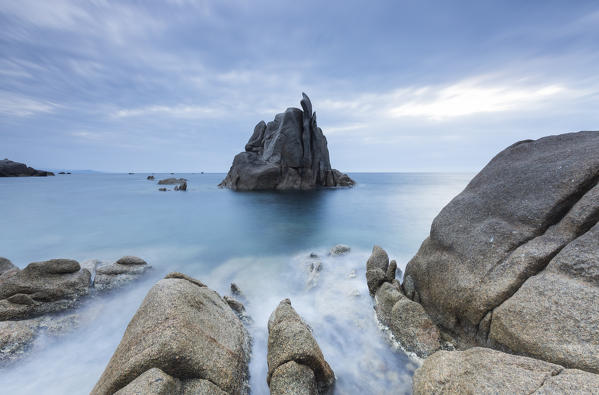 Dusk on modeled cliffs by wind framing blue sea Capo Testa Santa Teresa di Gallura Province of Sassari Sardinia Italy Europe