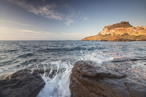 Sunset and blue sea frame the village on promontory Castelsardo Gulf of Asinara Province of Sassari Sardinia Italy Europe