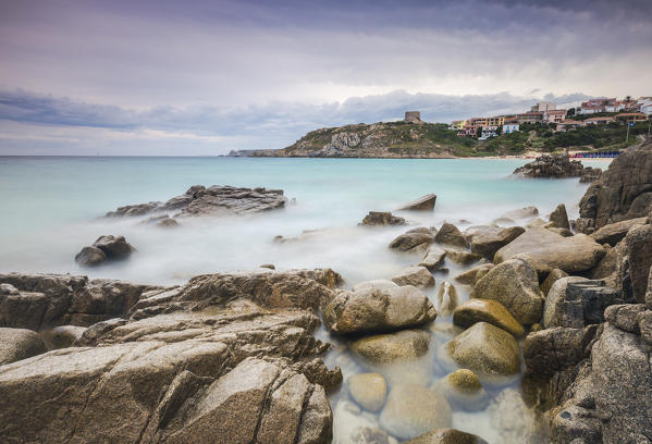 Storm clouds frame the village overlooking the turquoise sea Santa Teresa di Gallura Province of Sassari Sardinia Italy Europe