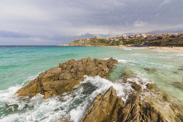 Storm clouds frame the village overlooking the turquoise sea Santa Teresa di Gallura Province of Sassari Sardinia Italy Europe