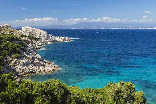 Green plants frame the turquoise sea and cliffs Capo Testa Santa Teresa di Gallura Province of Sassari Sardinia Italy Europe