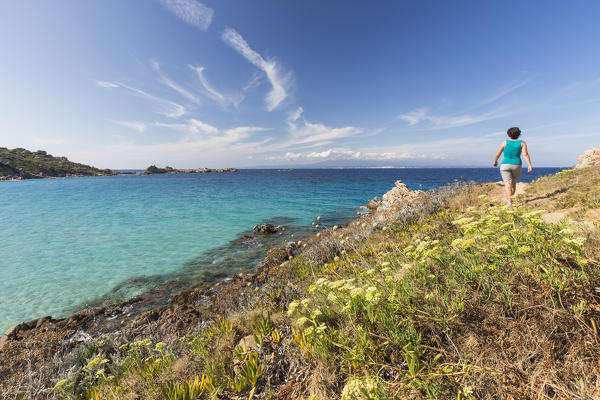 A walk on the path overlooking the turquoise sea Santa Teresa di Gallura Province of Sassari Sardinia Italy Europe