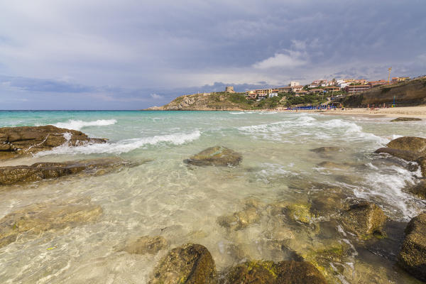 Storm clouds frame the village overlooking the turquoise sea Santa Teresa di Gallura Province of Sassari Sardinia Italy Europe