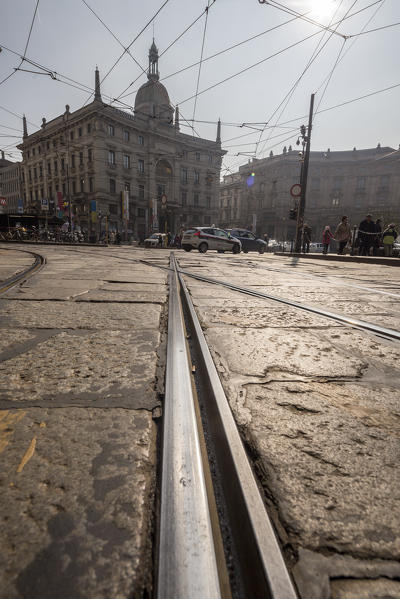 The rails of the old tram in the streets of the historical city center Milan Lombardy Italy Europe