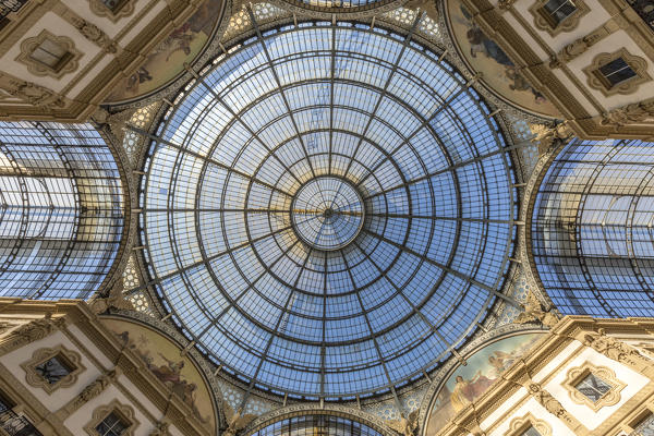View of the glass dome and artistic decorations of the historical Galleria Vittorio Emanuele II Lombardy Italy Europe