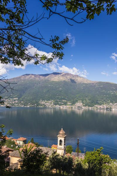 View of the bell tower and village of Dorio surrounded by Lake Como Province of Lecco Lombardy Italy Europe