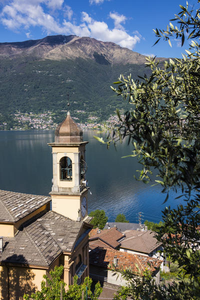 View of the bell tower and village of Dorio surrounded by Lake Como Province of Lecco Lombardy Italy Europe