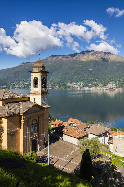 View of the bell tower and village of Dorio surrounded by Lake Como Province of Lecco Lombardy Italy Europe