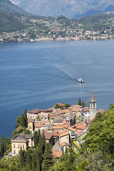 The typical village of Varenna surrounded by the blue water of Lake Como and gardens Province of Lecco Lombardy Italy Europe
