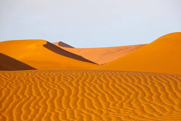 Losing yourself in the rolling dunes of the Namib that sing a desert song of sun, wind and sky Namibia, Africa