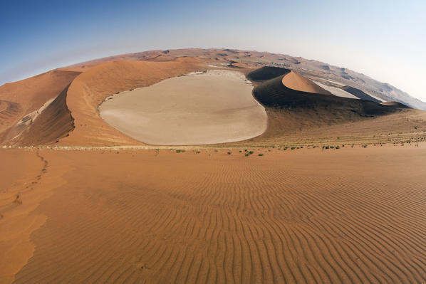Dead marsh surrounded by sandy dunes Deadvlei Sossusvlei Namib Desert Naukluft National Park Namibia Africa