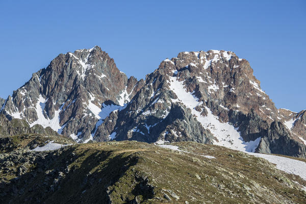 View of the snowy peak of Corni Bruciati at summer Malenco Valley Valtellina Province of Sondrio Lombardy Italy Europe