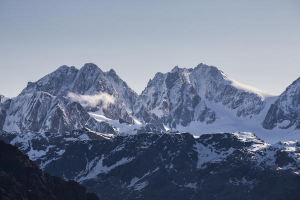 View of the snowy peak Bernina and peak Roseg at summer Malenco Valley Valtellina Province of Sondrio Lombardy Italy Europe