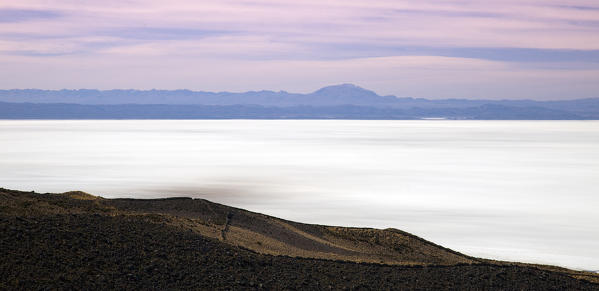 The great salt lake of southern Bolivia. Modern-day maps mostly name the lake Salar de Uyuni, for near its south-eastern shore is the small town of that name. But question the local indigenous folk whose ancestors have lived around the lake for thousands of years. You will learn its name is linked not to Uyuni but to the sacred mountain of Tunupa, which rises like a floating mirage from its northern shores. Bolivia, South America