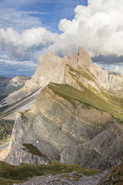 Blue sky and clouds on the rocky peaks of the Odle mountain range seen from Seceda Val Gardena Trentino Alto Adige Italy Europe