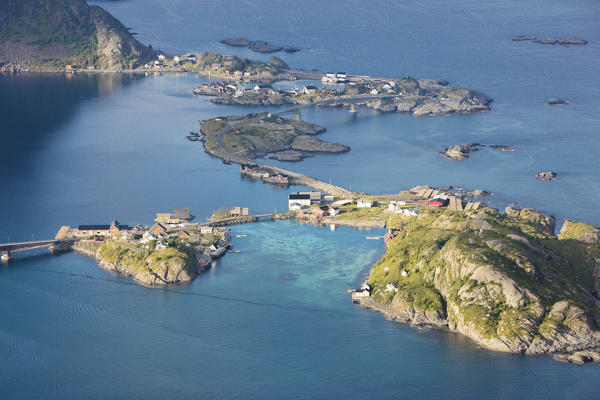 Top view of the typical houses connected by bridges framed by the blue sea Reinebringen Moskenes Lofoten Islands Norway Europe