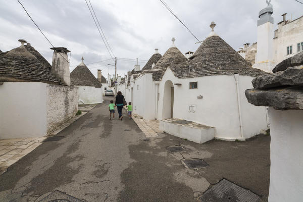 The typical huts called Trulli built with dry stone with a conical roof Alberobello province of Bari Apulia Italy Europe