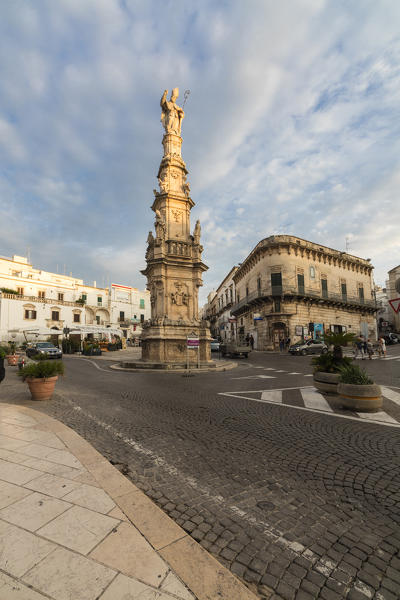 Historical buildings and statues in the medieval city center of Ostuni province of Brindisi Apulia Italy Europe